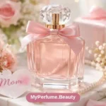 Elegant perfume bottle presented as a gift for mom with soft flowers